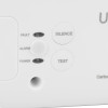 Close up of button and LED labels on sealed 10 year carbon monoxide detector showing silence and test buttons with fault alarm and power indicators