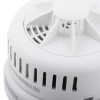 Closeup of the sounder part of the ultrafire radio interlinked 10yr battery heat alarm showing vents and circular design